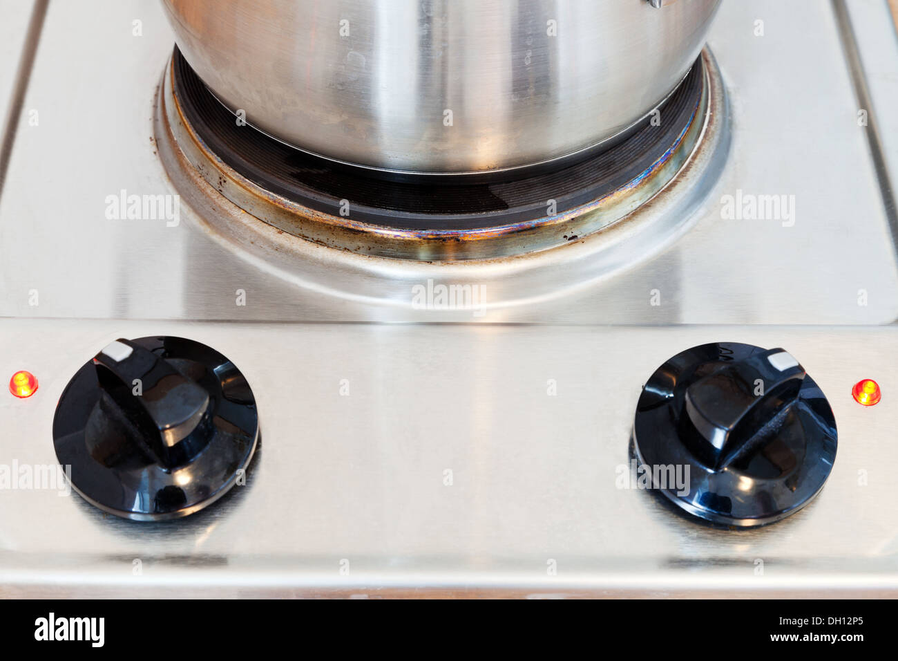 metal pot on hotplate electric stove Stock Photo