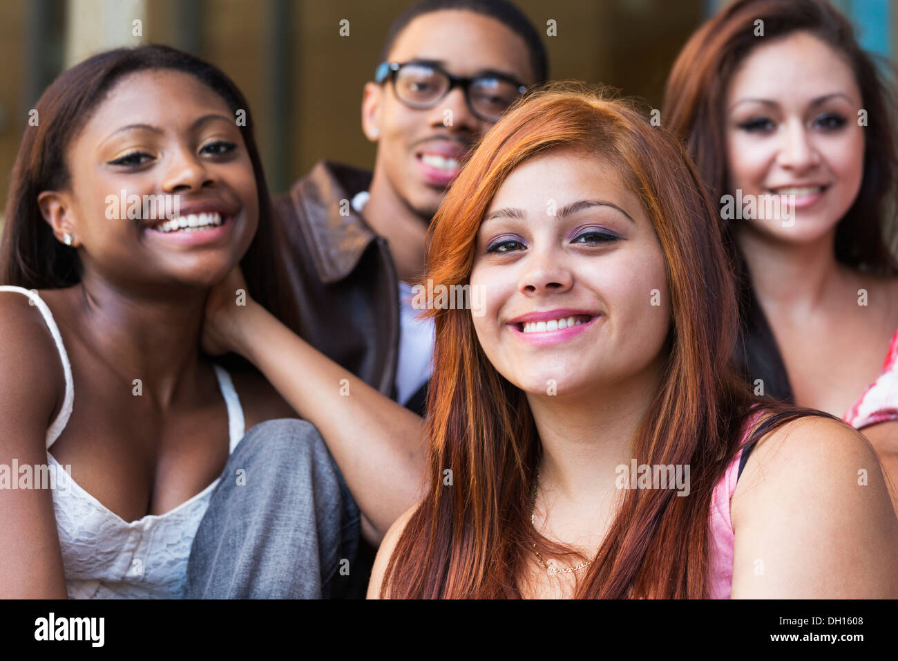 Teenagers smiling outdoors Stock Photo