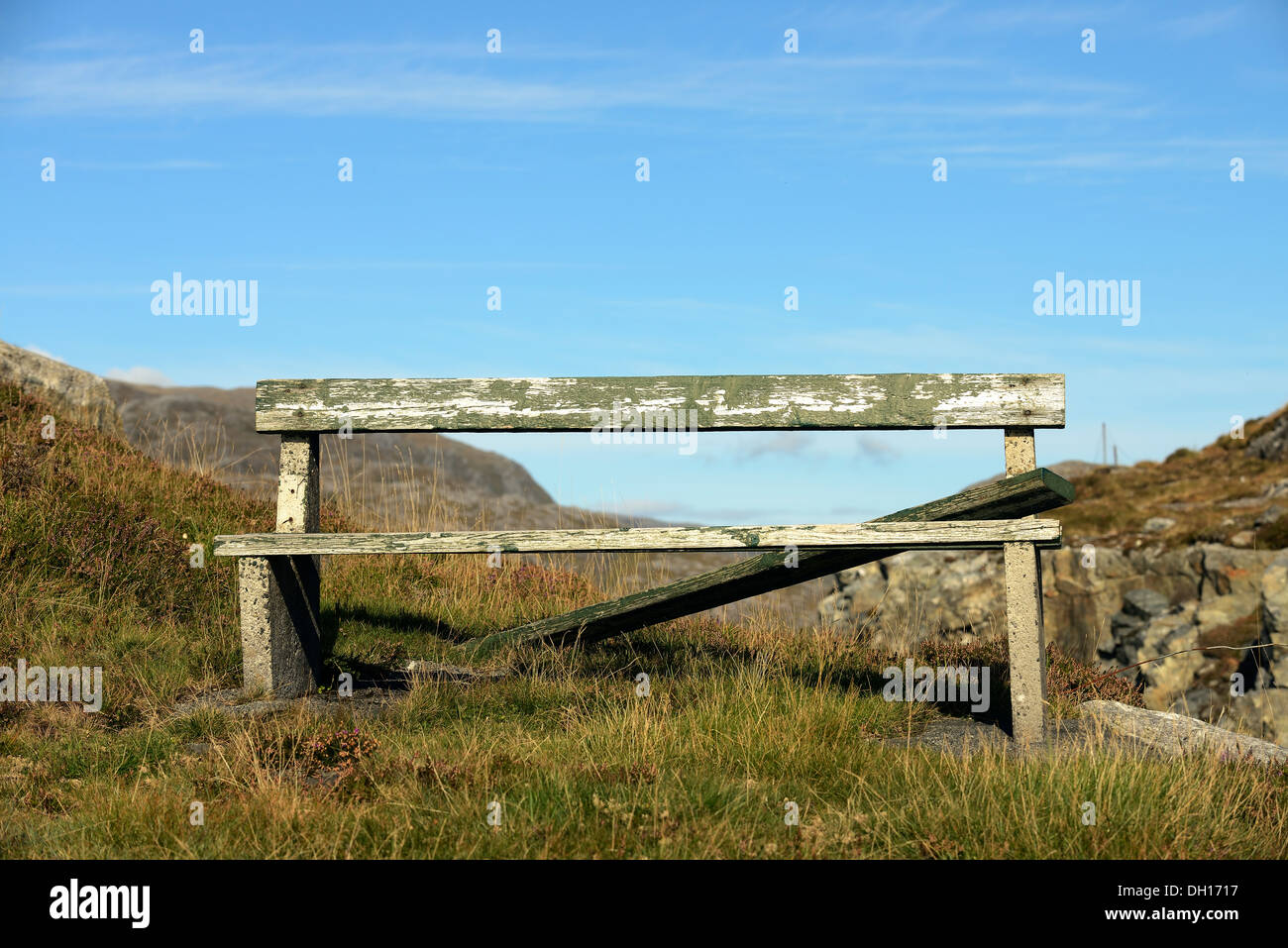 Old broken bench at a viewpoint on the Isle of Harris Stock Photo