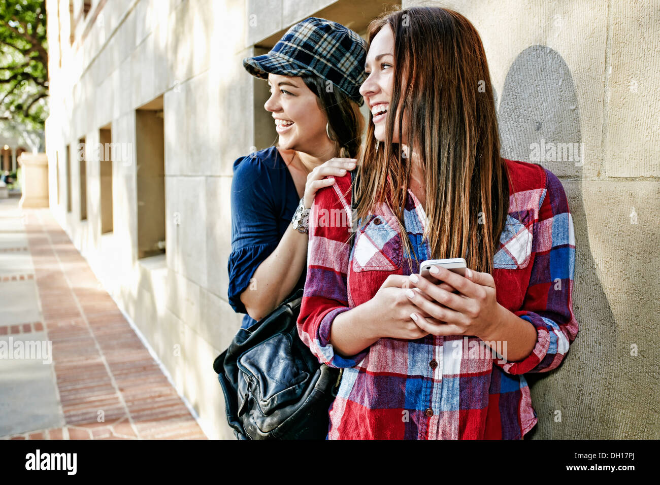 Caucasian students smiling on campus Stock Photo