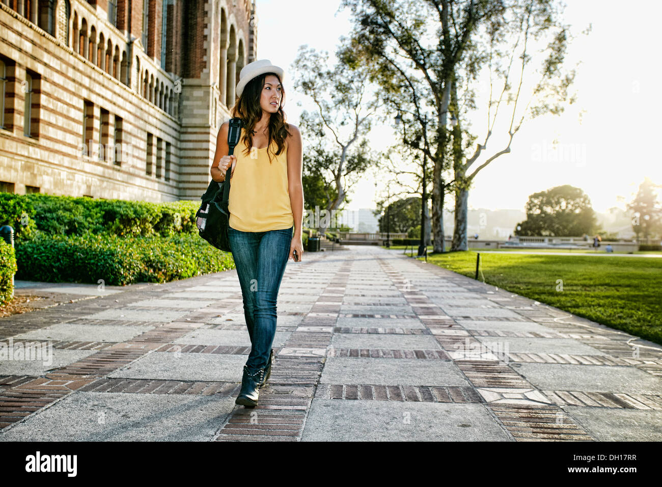 Korean student walking on campus Stock Photo - Alamy