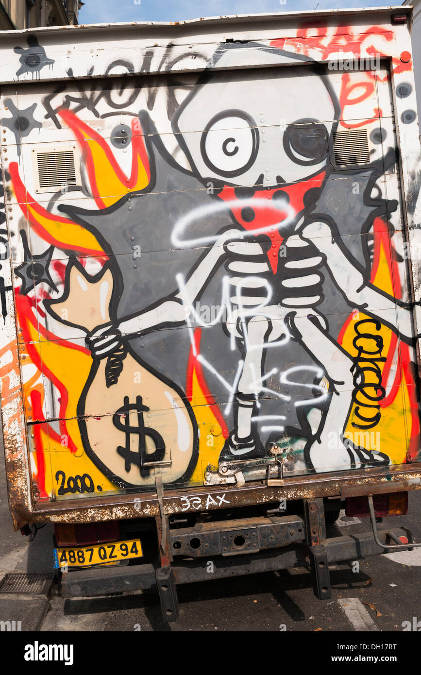 Graffiti on delivery van, Paris, France Stock Photo