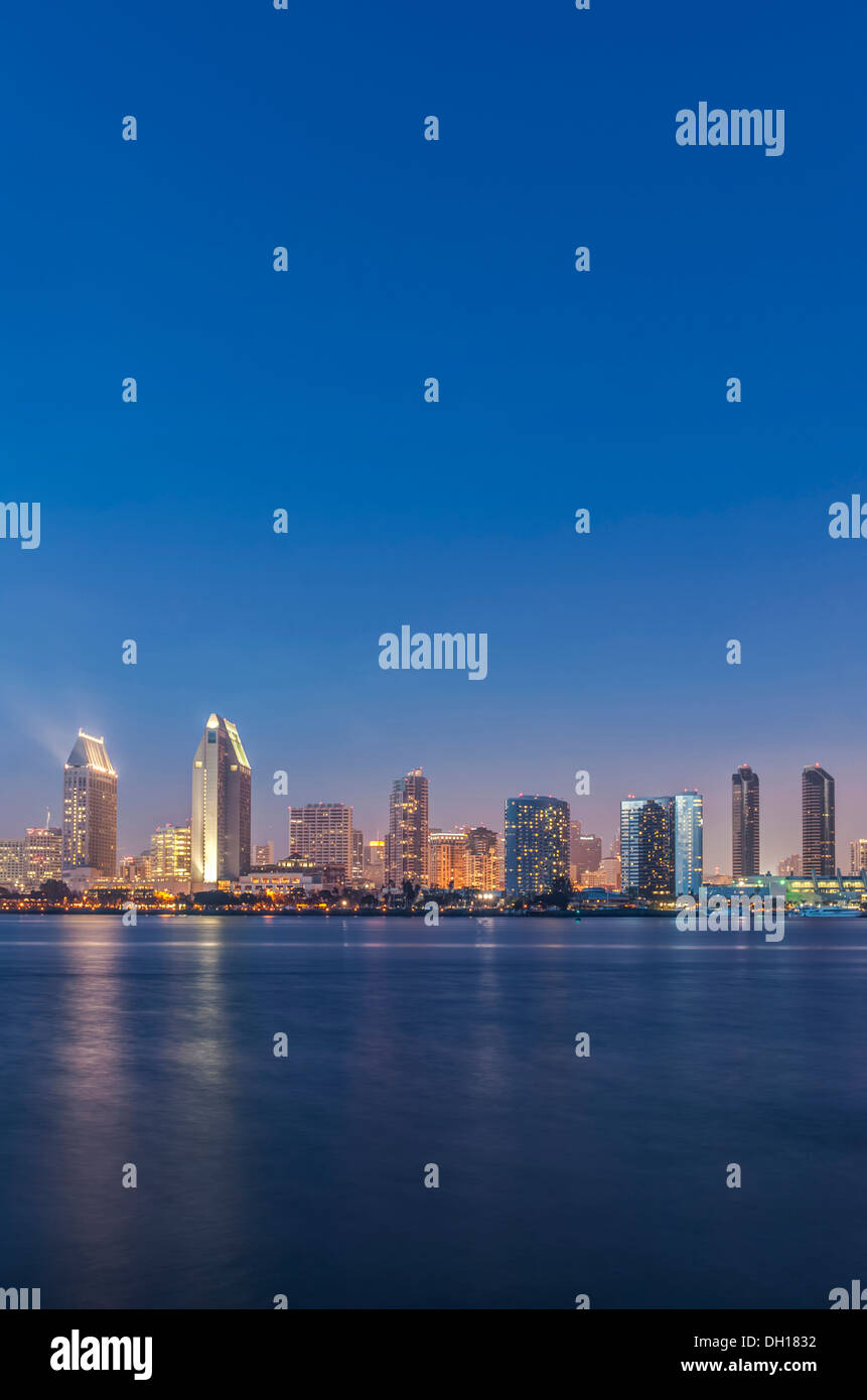 City skyline lit up at night, San Diego, California, United States Stock Photo