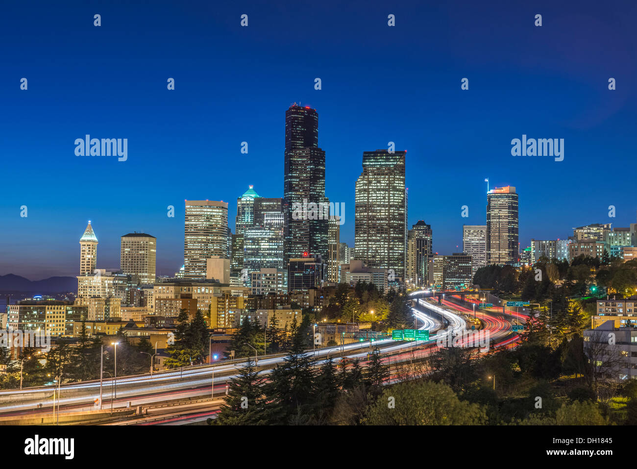 City skyline lit up at night, Seattle, Washington, United States Stock Photo