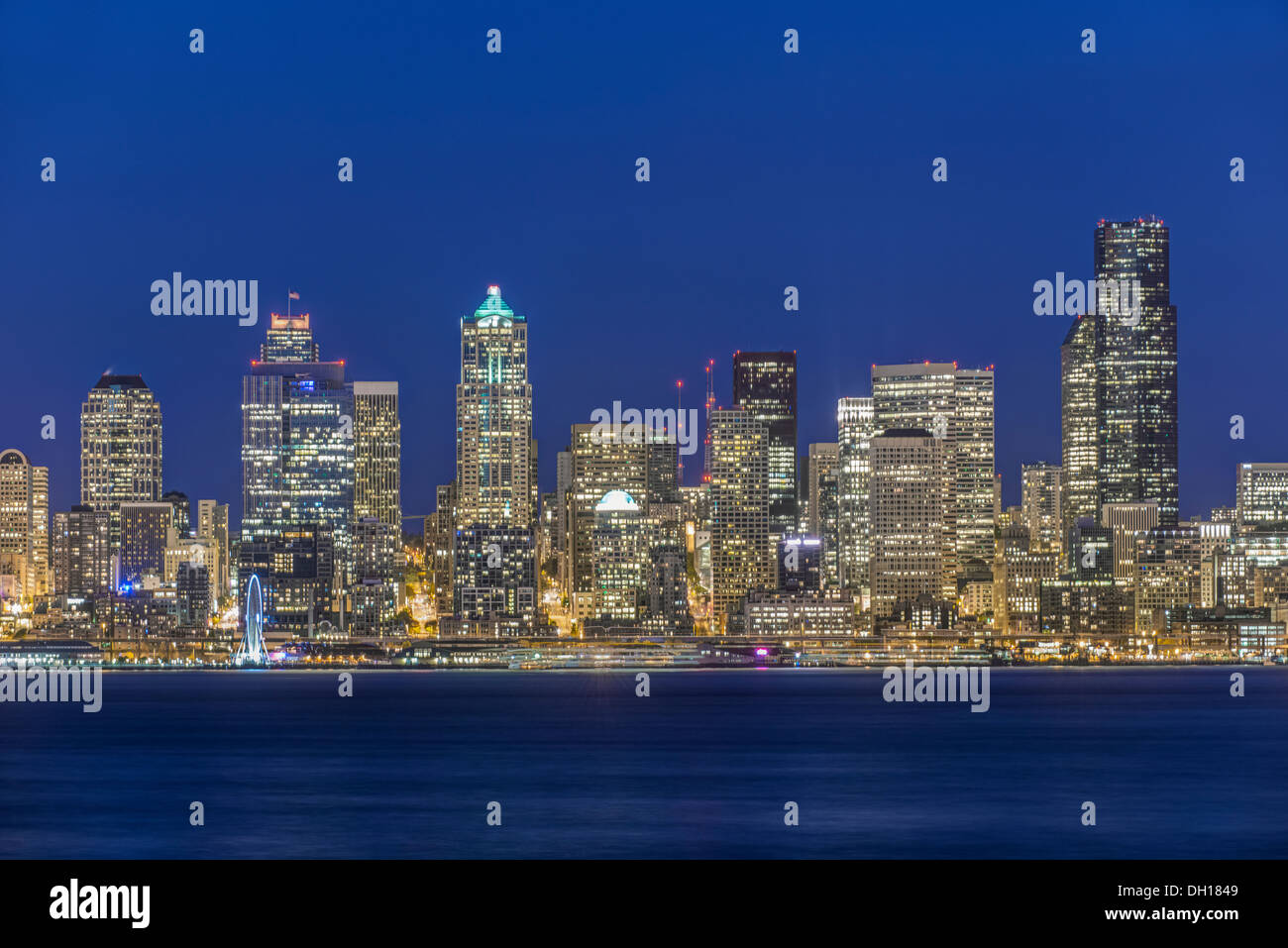 City skyline lit up at night, Seattle, Washington, United States Stock Photo