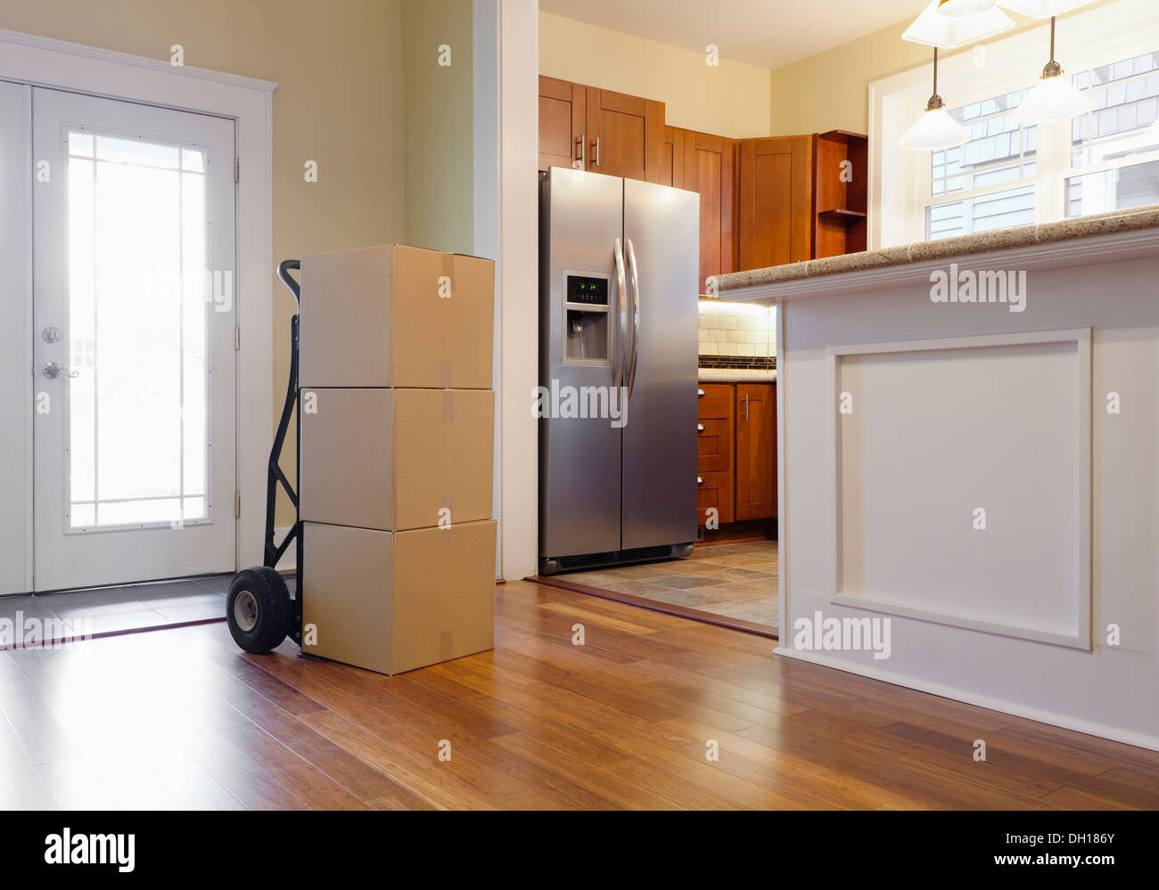 Cardboard boxes in new house Stock Photo