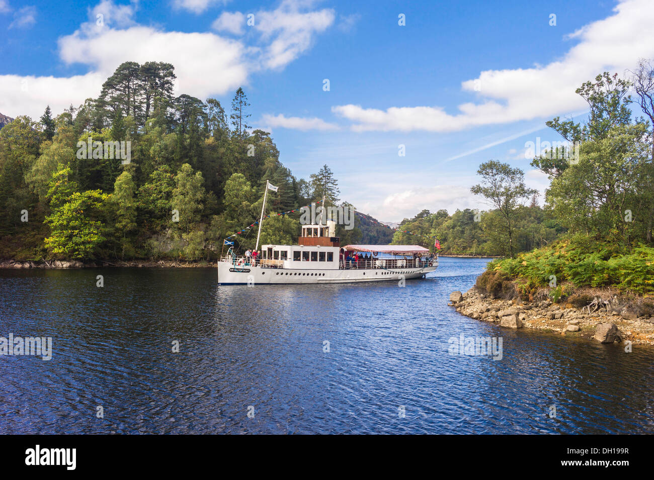 The steamship The Sir Walter Scott on Loch Katrine carrying passengers and sailing towards her berth at the Trossachs pier Stock Photo