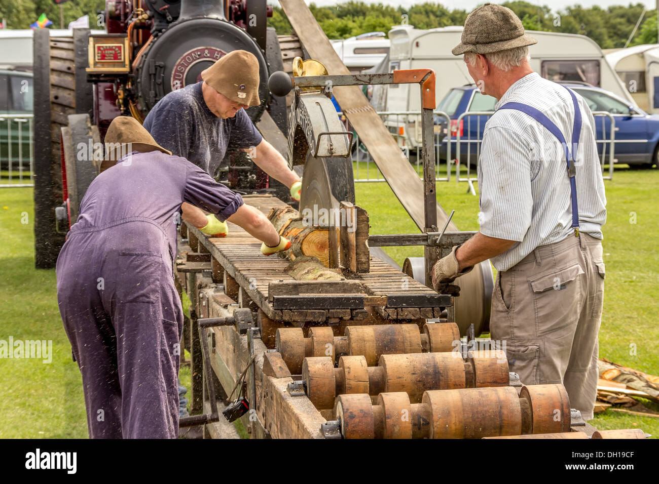 Wood cutter using a steam driven belt to circular saw Stock Photo Alamy