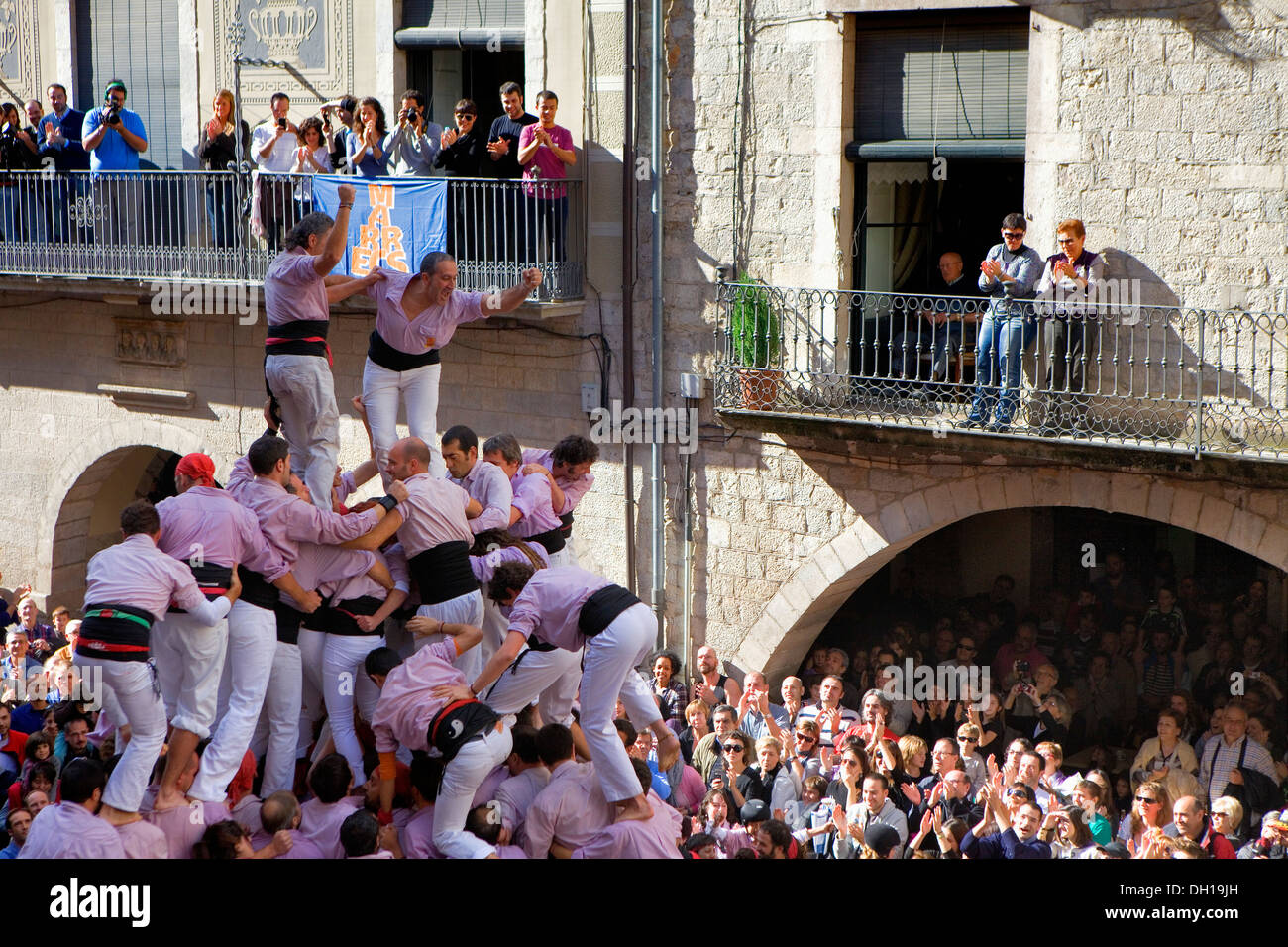 Celebrating a great success.Minyons de Terrassa.'Castellers'.Fires i festes de Sant Narcis.Plaça del Vi.Girona.Spain Stock Photo