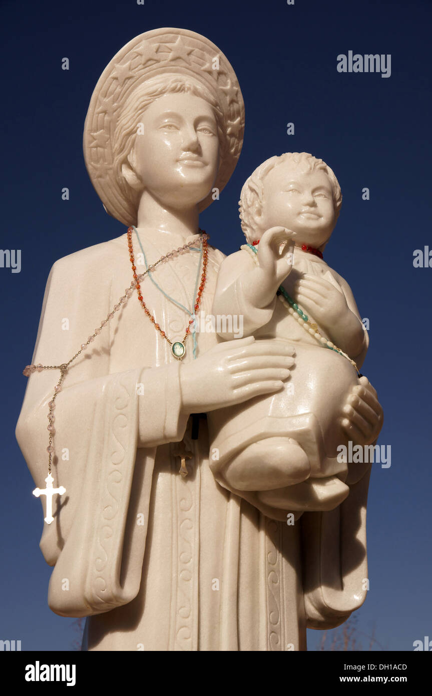 madonna and child kid sculpture statue El Santuario de Chimayo Roman Catholic church in New Mexico nm USA. is Stock Photo