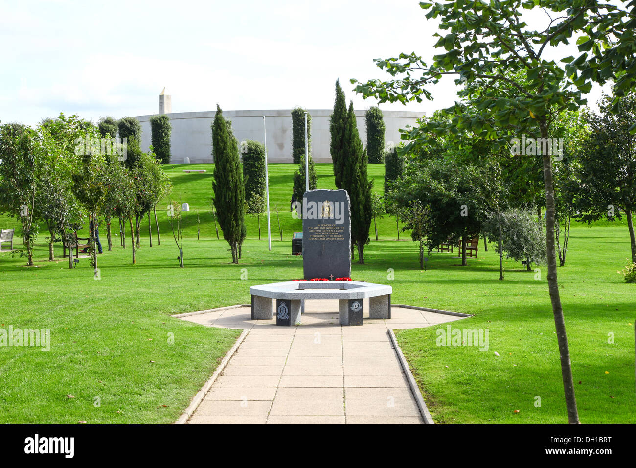 The Adjutant General's Corps memorial with the armed forces memorial in the background The National Memorial Arboretum, Alrewas, near Lichfield, UK Stock Photo