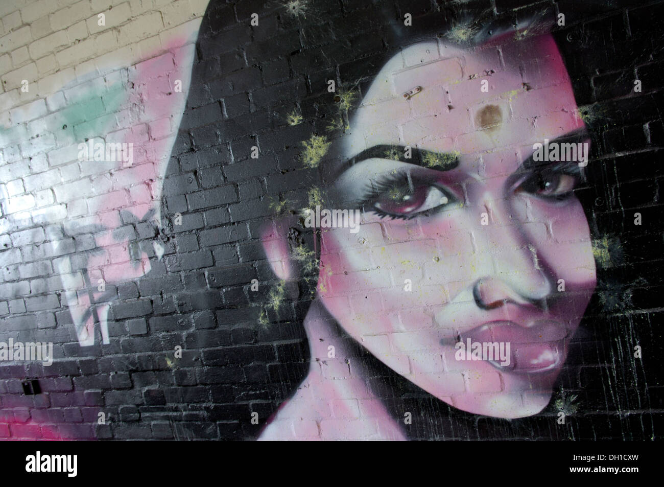 Graffiti found in a ruined industrial unit is Port Talbot South Wales, the factory has since been knocked down. Stock Photo
