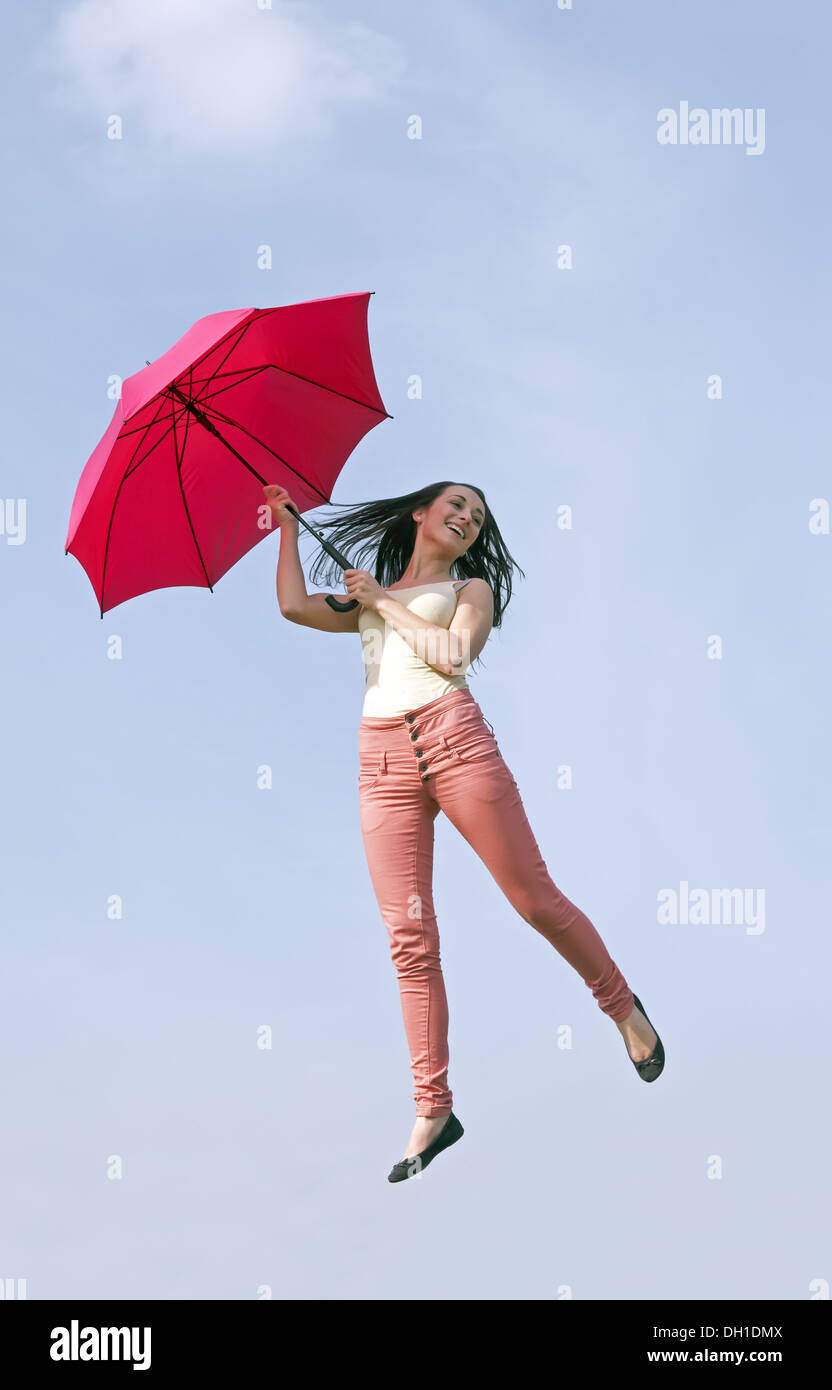 Flying umbrella hi-res stock photography and images - Alamy