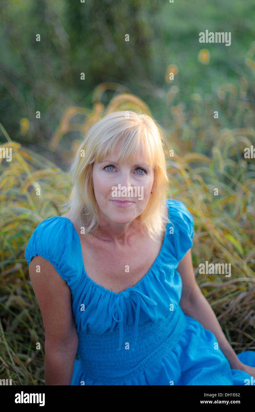 Pretty Middle aged woman outdoors Stock Photo
