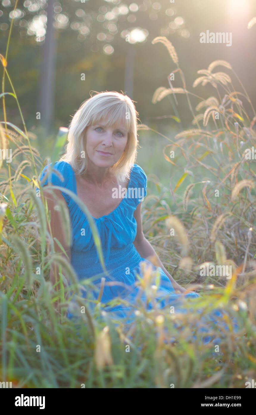 Pretty middle aged woman outdoors Stock Photo