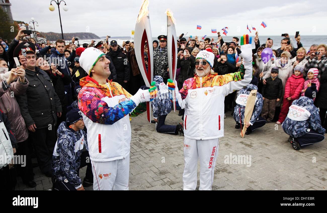 Svetlogorsk, Russia 29th, October 2013 Olimpic torch of Winter Olimpic games Sochi 2014 visits Kliningrad's Oblast. Relay participants ran through the streets of Svetlogorsk City at the Baltic Sea coast. Credit:  Michal Fludra/Alamy Live News Stock Photo