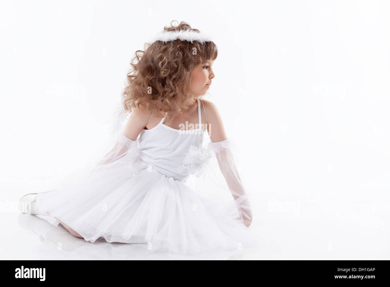 Adorable little angel isolated on white Stock Photo - Alamy