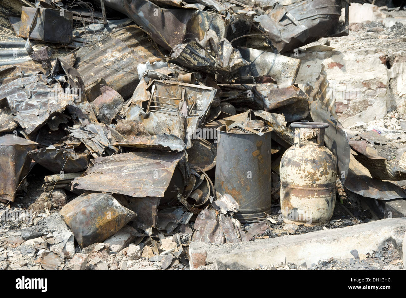 damaged fire destroyed tin house bandra slums mumbai Maharashtra India Asia Stock Photo