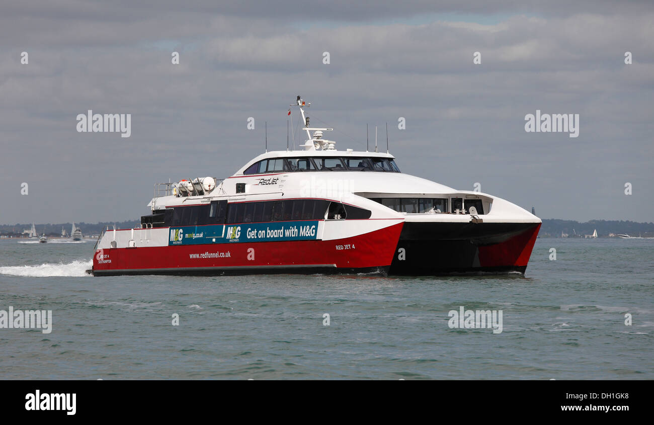 Red Funnel line Red Jet 4 passenger ferry heading into Cowes, Isle of Wight, Hampshire, England Stock Photo