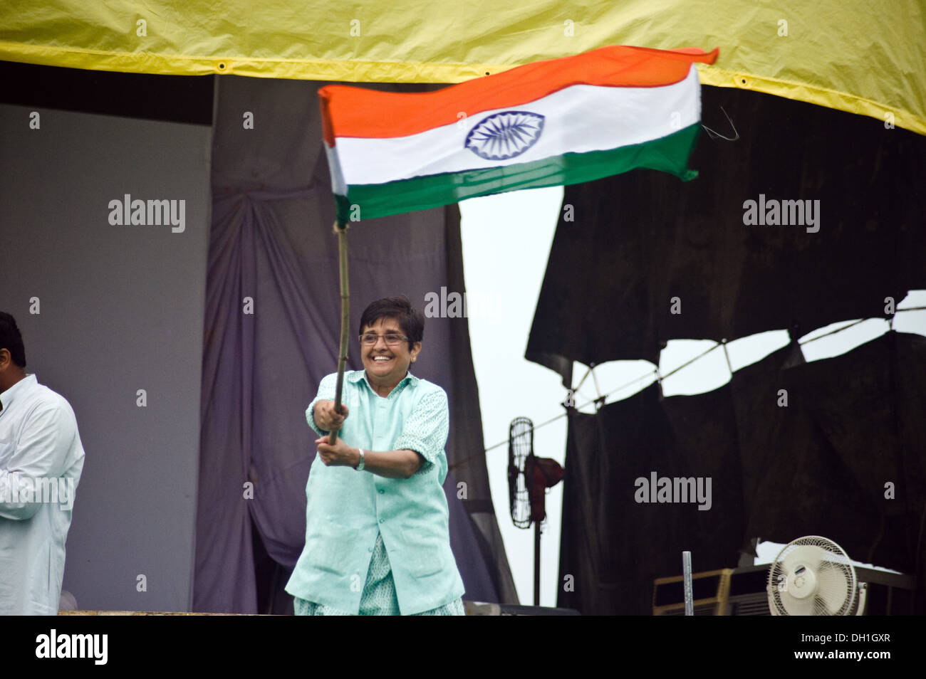 Kiran Bedi waving flag of India supporting Anna Hazare at Ramlila Maidan New Delhi India Asia Stock Photo
