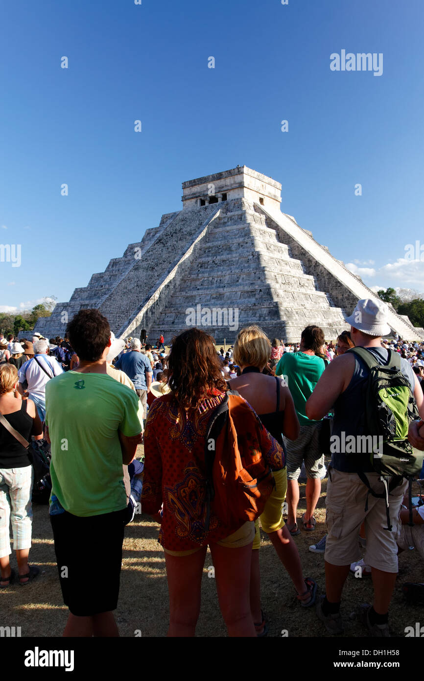 People await the spring equinox with its famous shadowplay at the Mayan Kukulkan pyramid at Chichen Itza, Yucatan, Mexico. Stock Photo