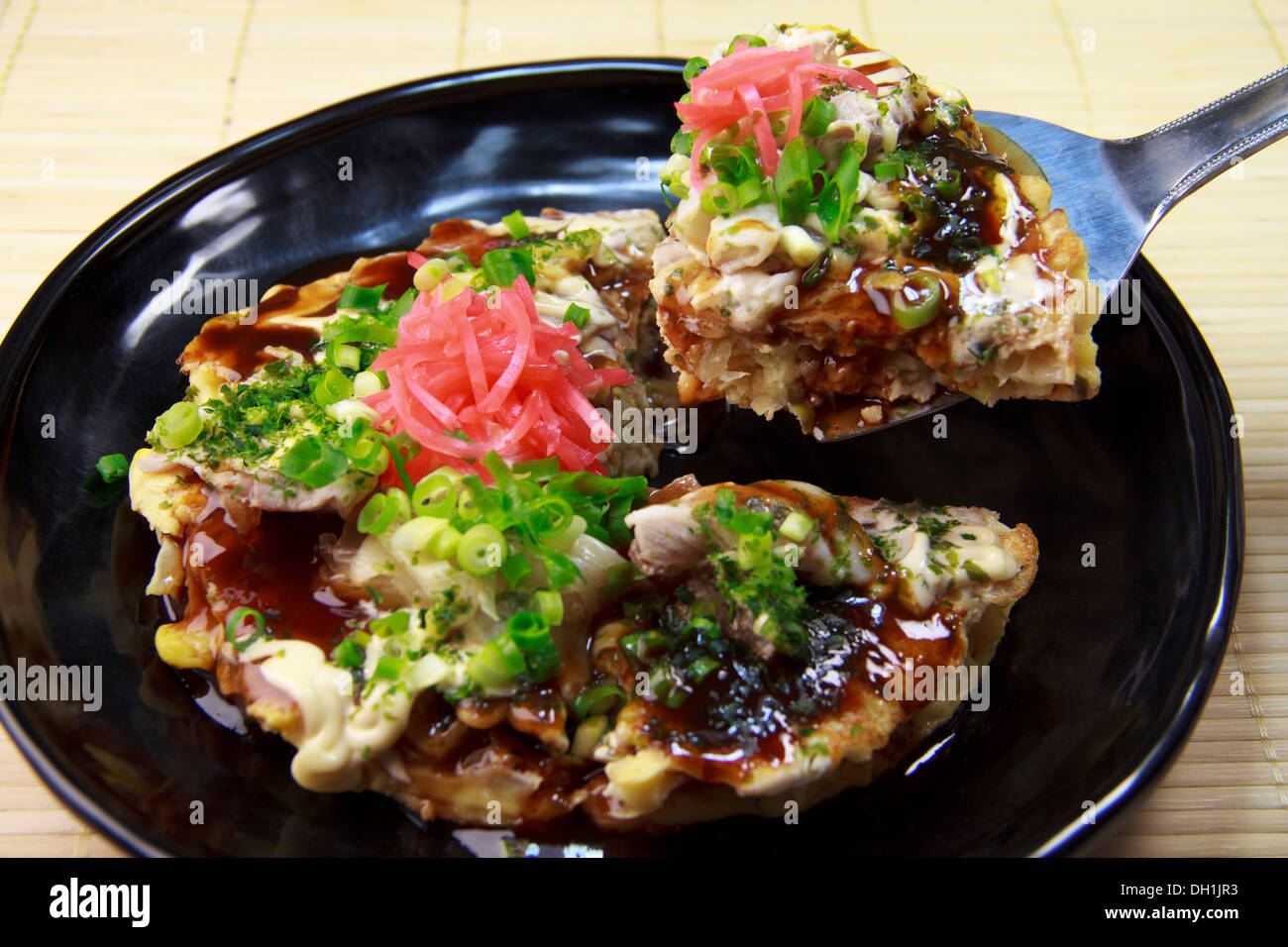 Okonomiyaki (Japanese savory pancake) Stock Photo
