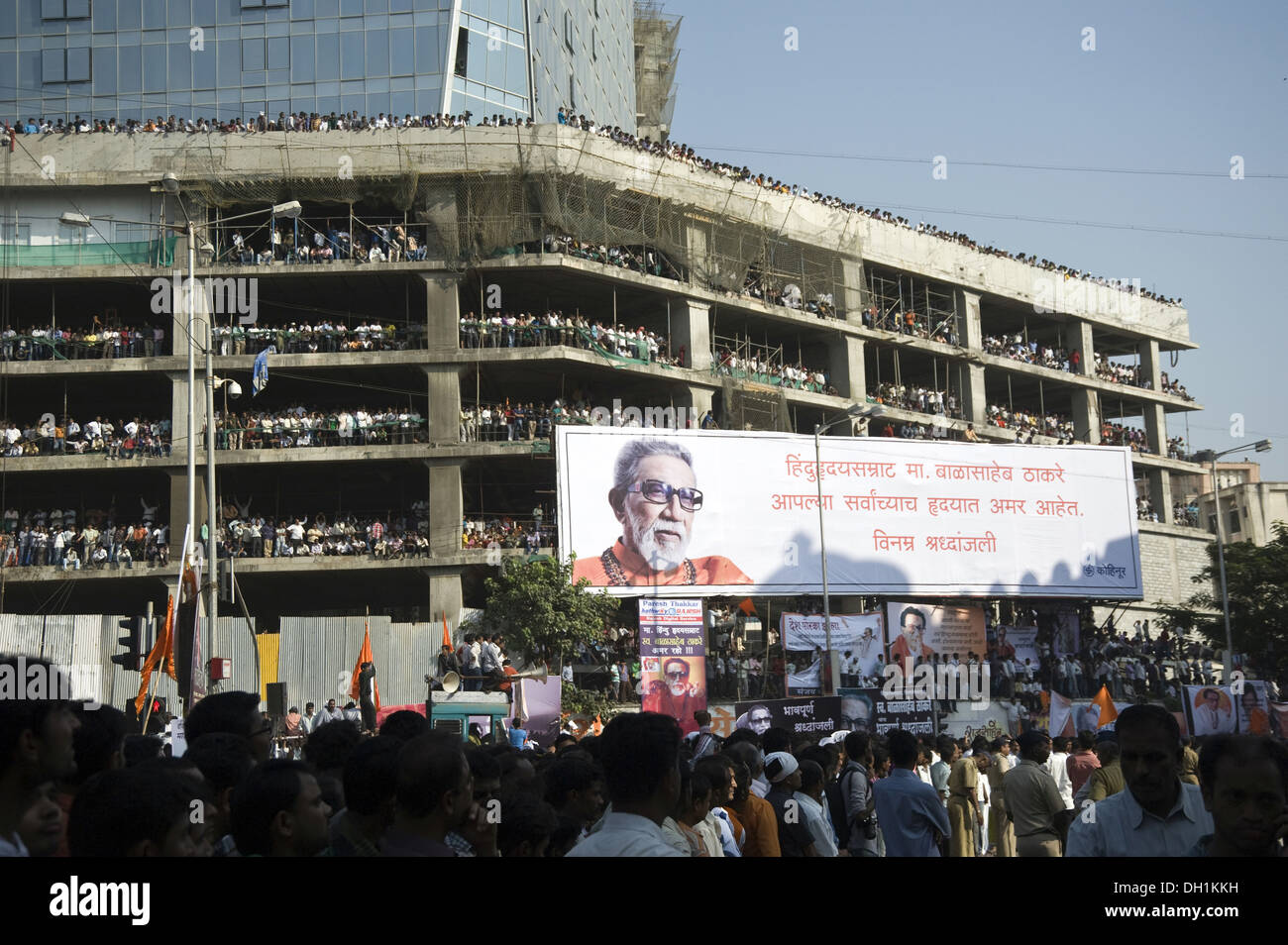 crowd of people in building to see funeral procession of Shiv Sena Chief Bal Thackeray mumbai maharashtra india asia Stock Photo