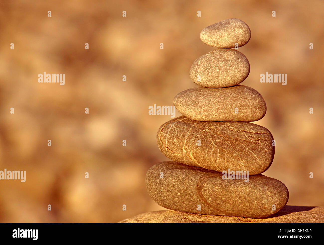 pile of stones in light of sun Stock Photo