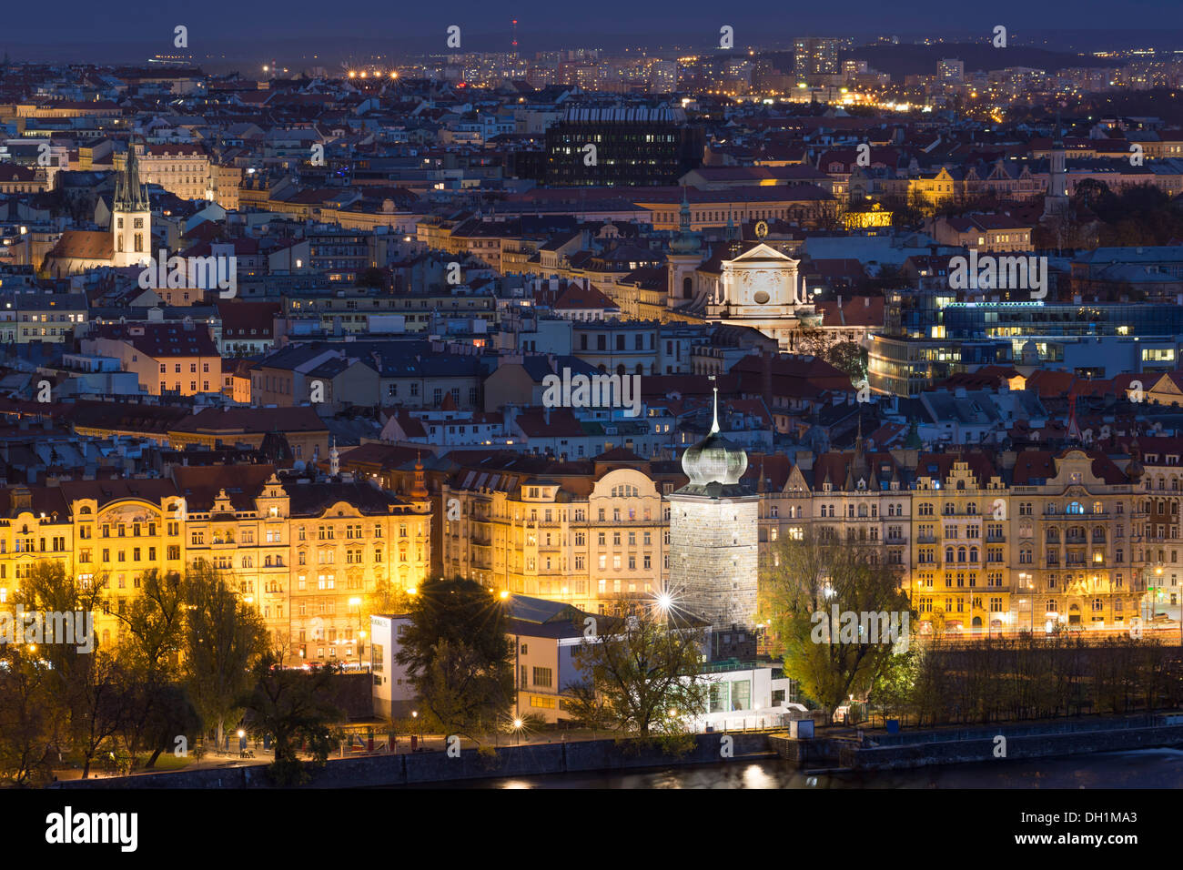 night cityscape, functionalistic Manes Gallery and St. Ignatius Church, New Town, Prague, Czech Republic Stock Photo