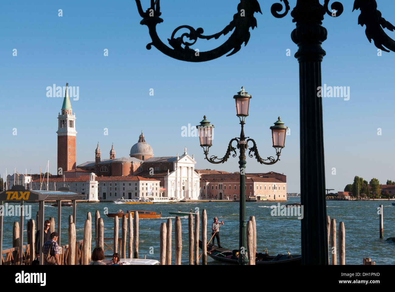 Quay at St Mark's Square with gondolas and the view to San Giorgio Maggiore Island, Venice, UNESCO World Heritage Site, Italy Stock Photo