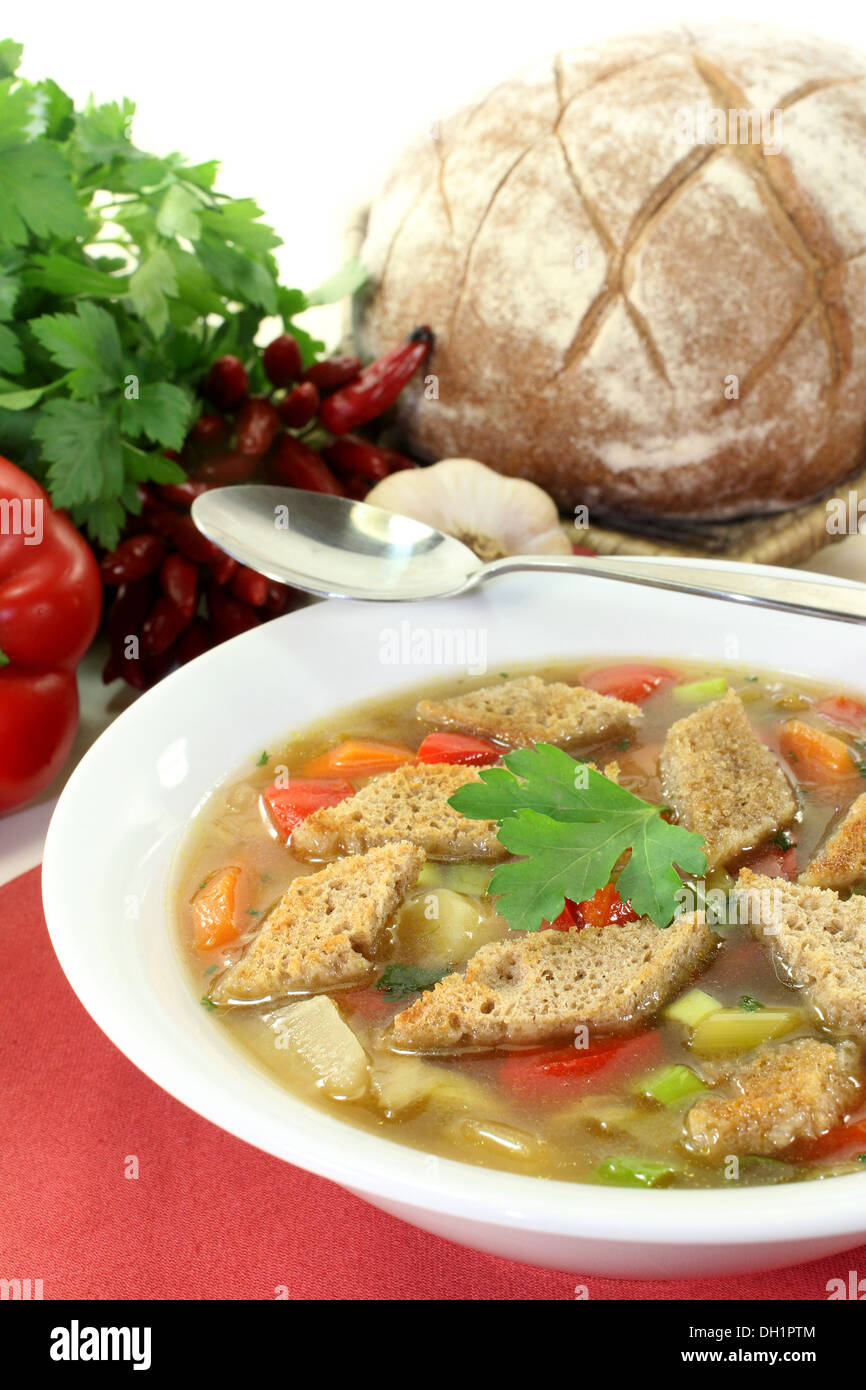 a plate with a colorful bread soup Stock Photo