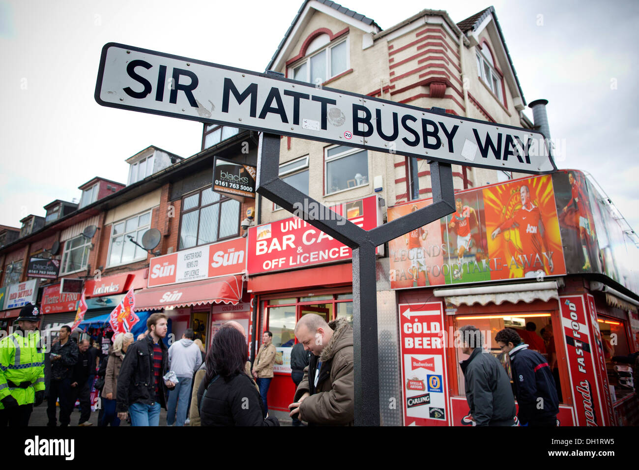 Sir Matt Busby Way, Old Trafford in Stretford, the home of Machester United Football Club, Manchester, North England, UK Stock Photo