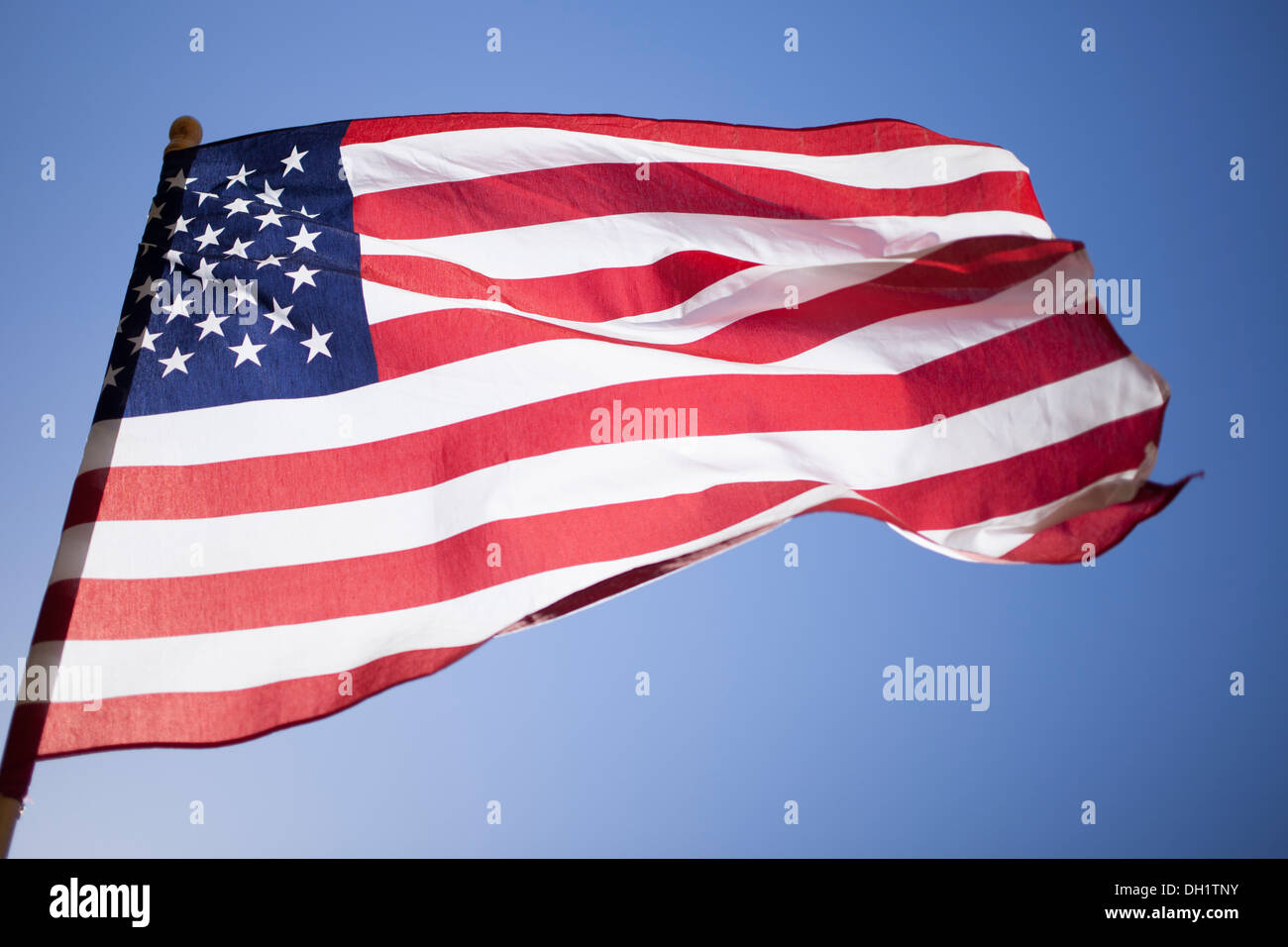 An American flag blows in the wind on Memorial Day 2012 in Wine Country in California. Stock Photo