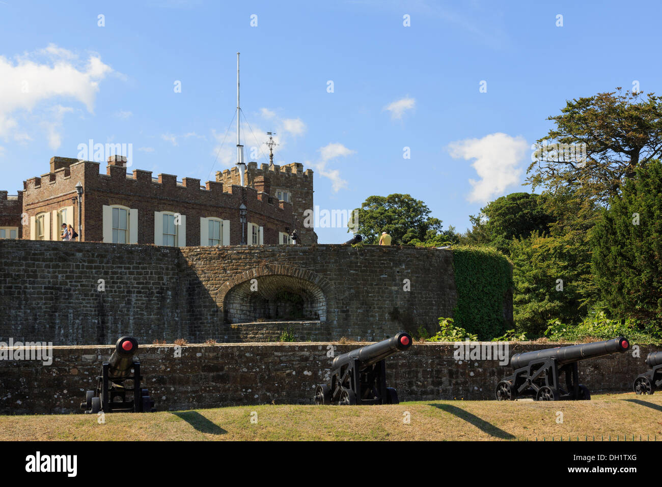 Henry VIII's 16th century Walmer Castle with cannons outside walls near Deal, Kent, England, UK, Britain Stock Photo