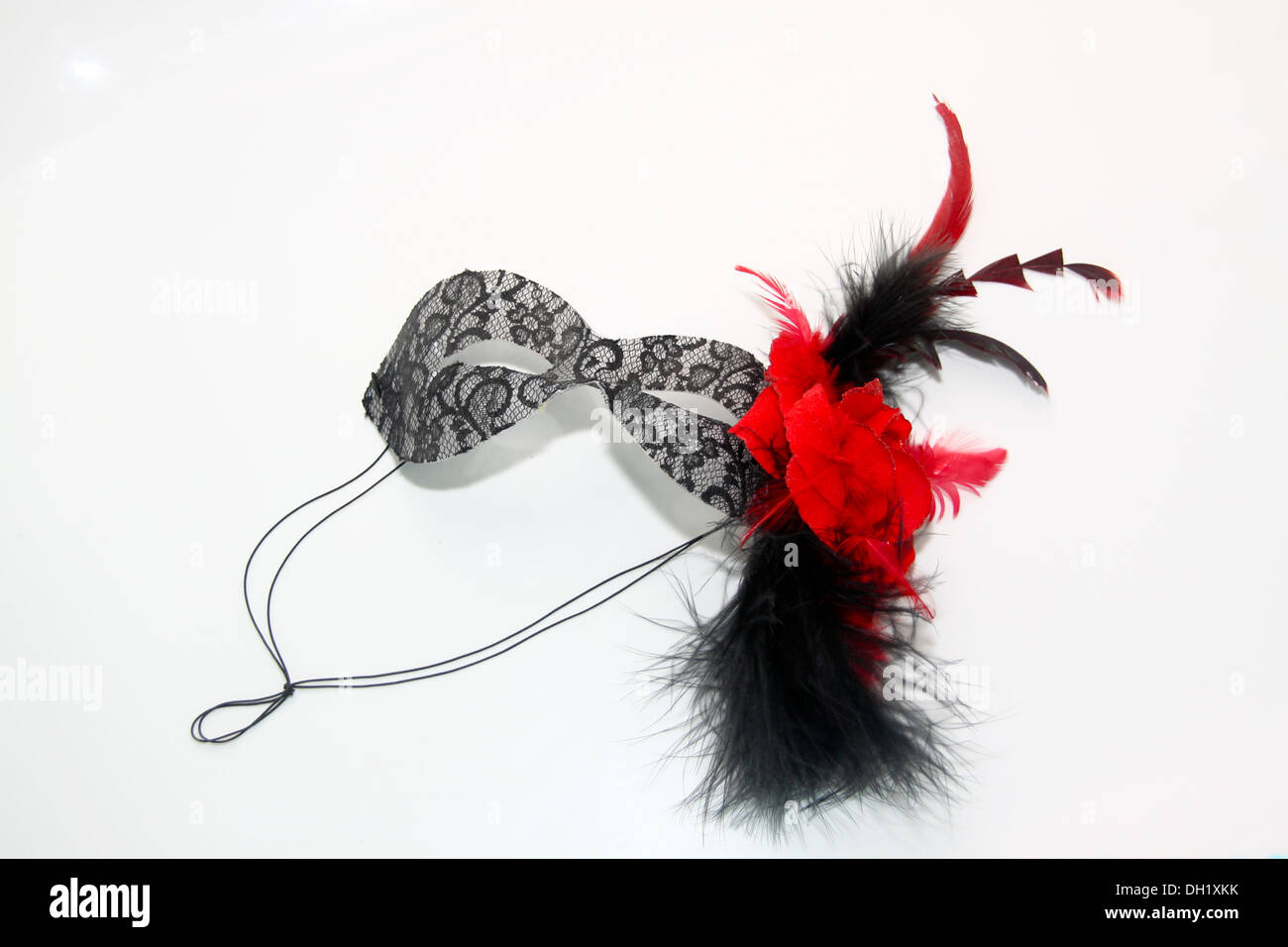 Black masquerade mask with feathers Stock Photo