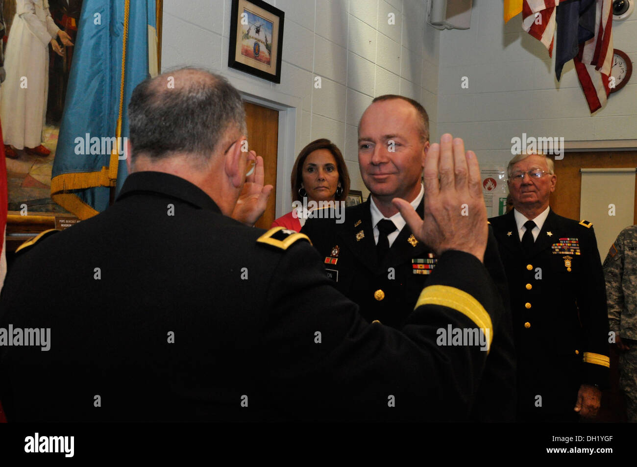 Maj. Gen. Frank Vavala, adjutant general, Delaware National Guard delivers the oath to Col. Bruce Walton, Oct. 21, 2013. Stock Photo