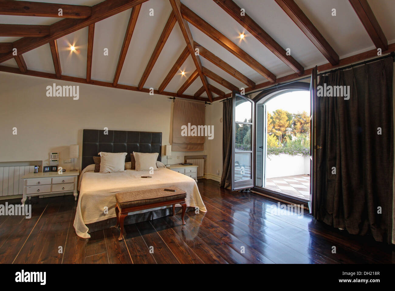 Polished Wooden Floor In Spanish Country Bedroom With