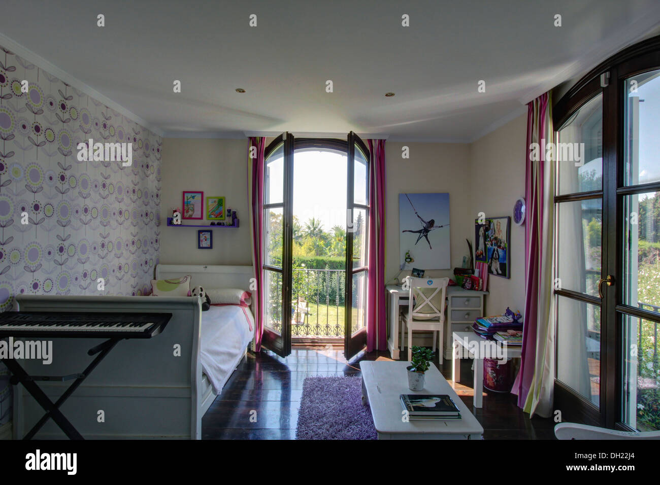Keyboard At The End Of Single Bed In Teenage Bedroom With