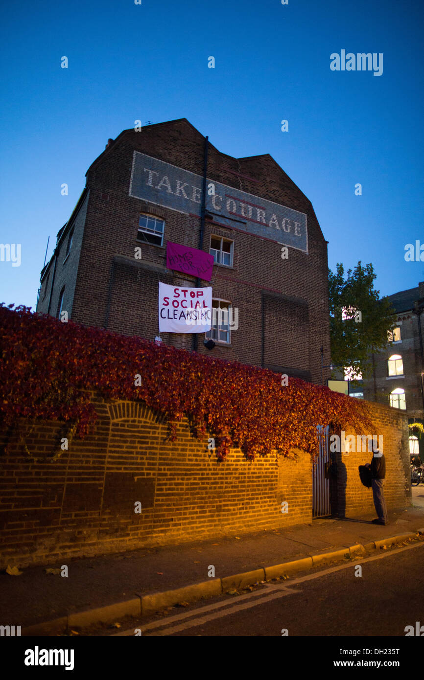 Protest banners hang from the occupied house in Park Street, SE1. The building was sold by Southwark Council for £2.96M Stock Photo