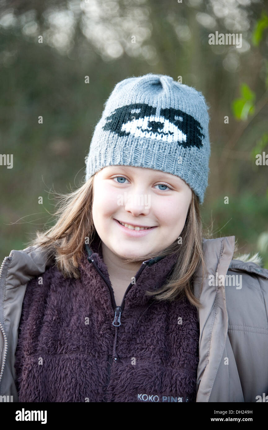 Young Girl wrapped up winters walk healthy FULLY MODEL RELEASED Stock Photo
