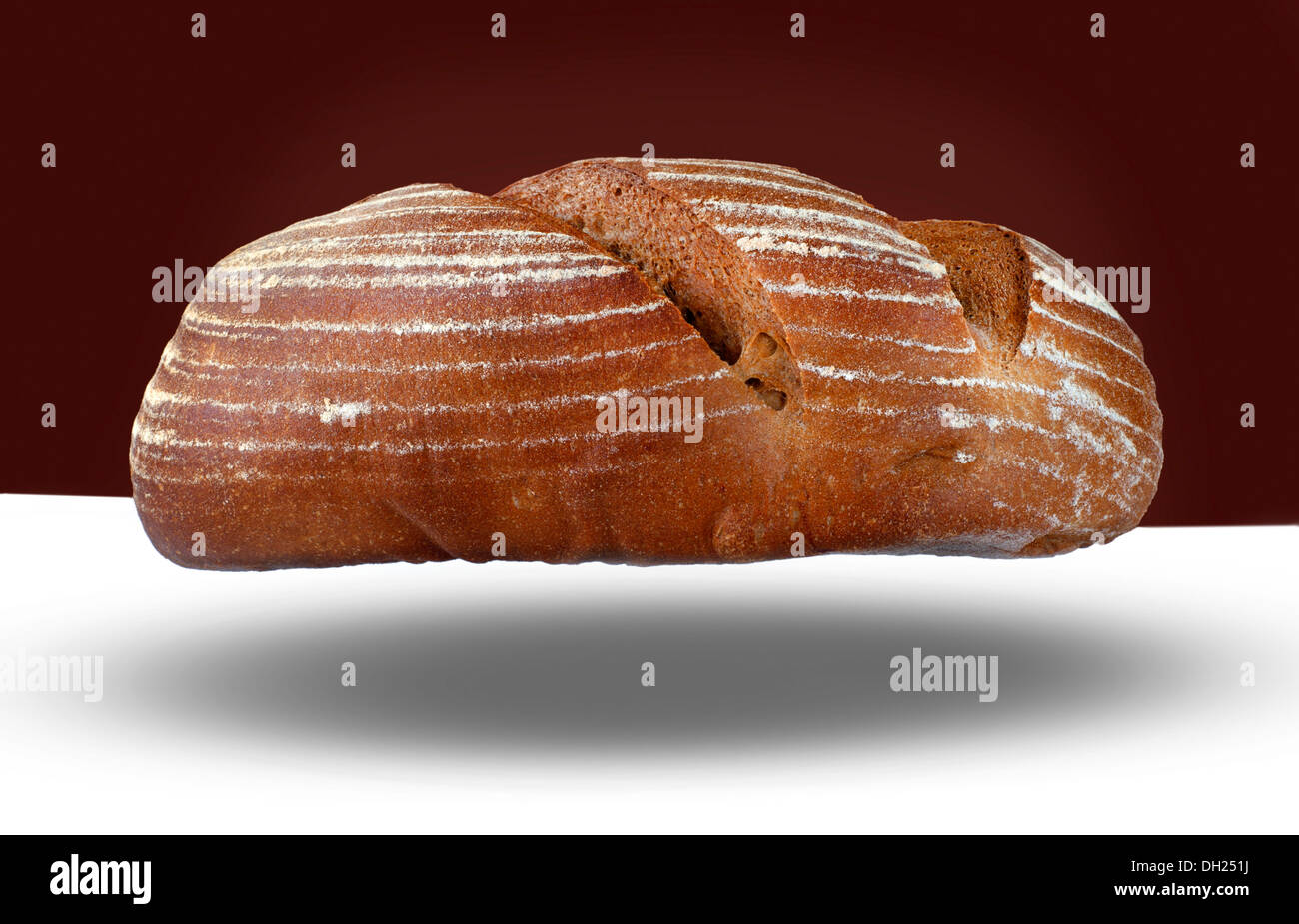 Bread - loaf of dark rye sourdough bread Stock Photo