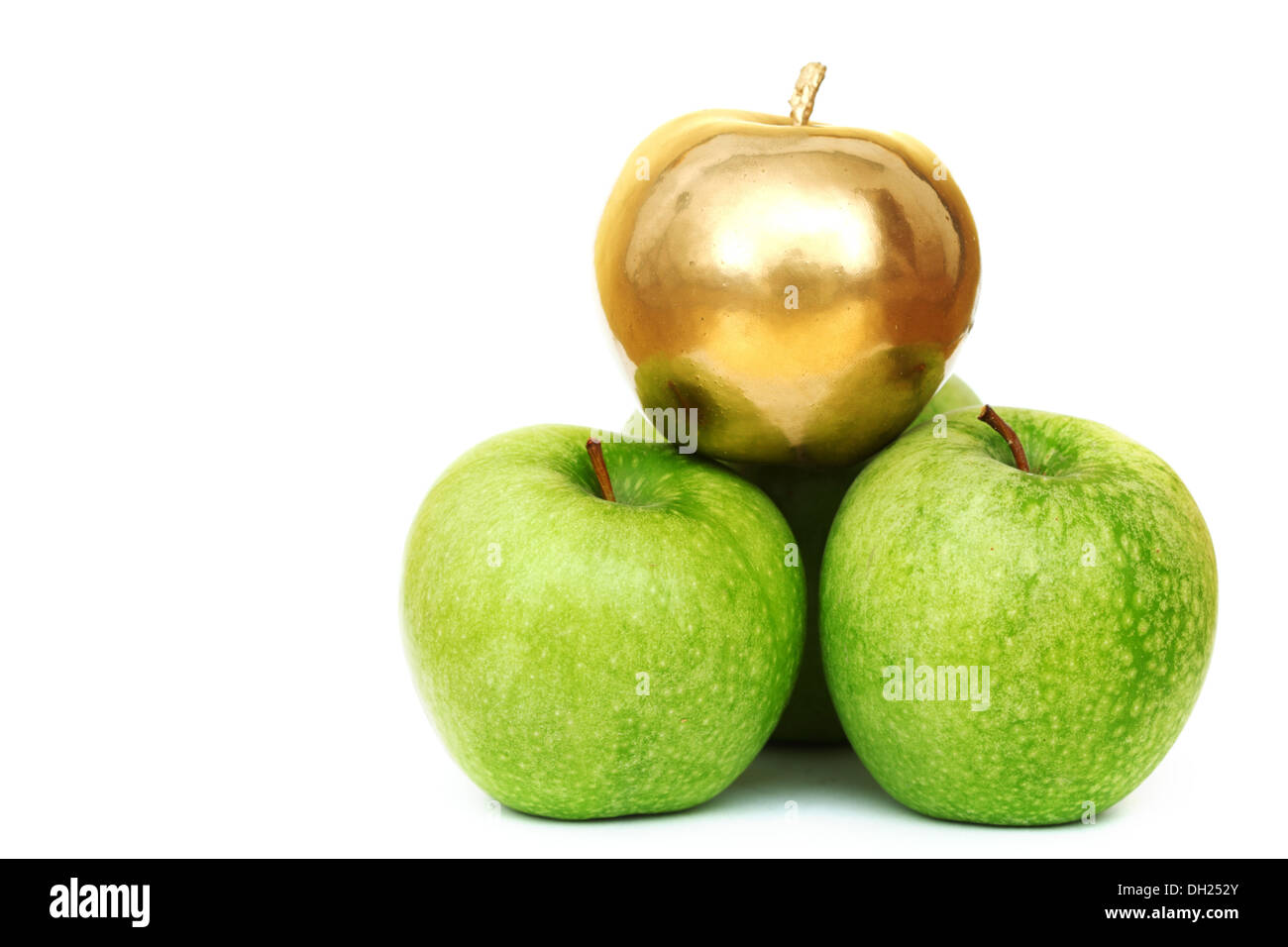 gold and green apples on white background Stock Photo