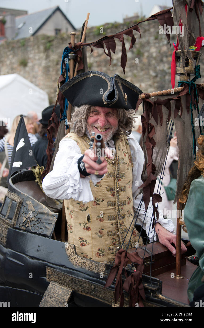 Pirate Captain pointing gun at viewer flintlock pistol Stock Photo