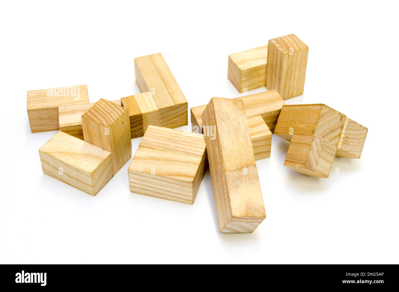 A wooden cube puzzle over white Stock Photo