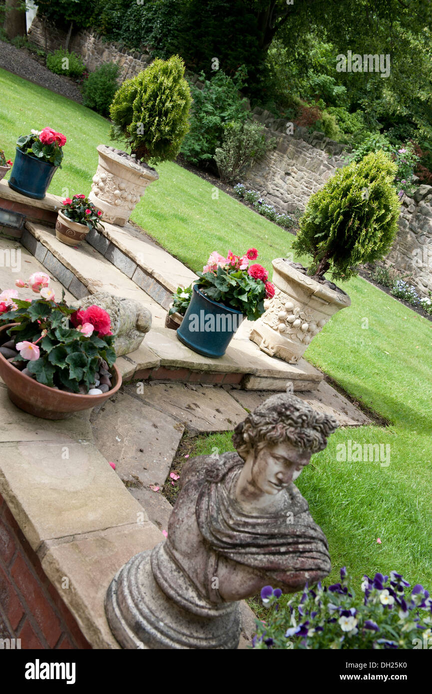 Formal Country Garden Stone Bust Urns Lawns Flowers Stock Photo