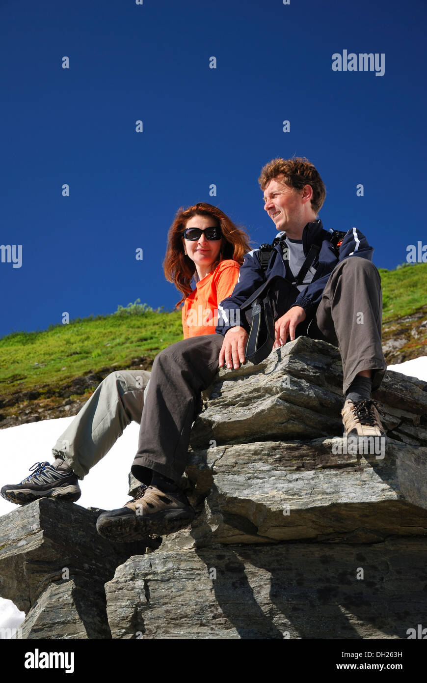 Happy man woman hiking mountains hi-res stock photography and images ...