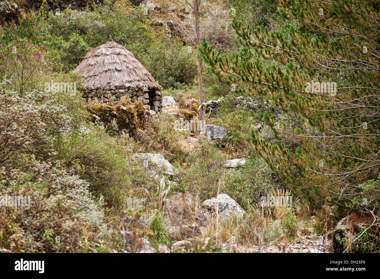 A traditional stone hut at Cojup in the Peruvian Andes, South America Stock Photo