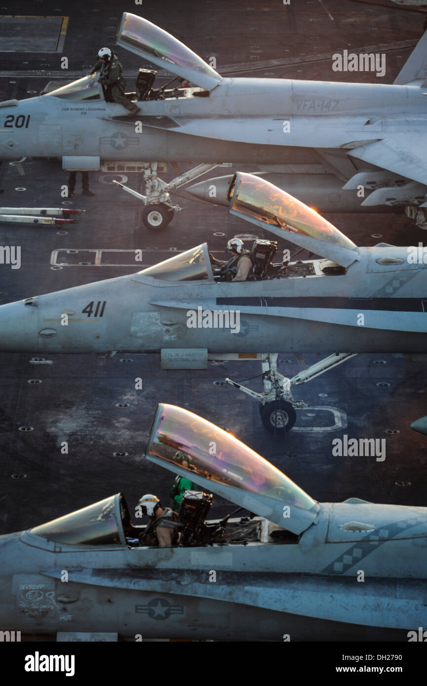 Pilots prepare for flight operations aboard the aircraft carrier USS Nimitz (CVN 68). Nimitz is