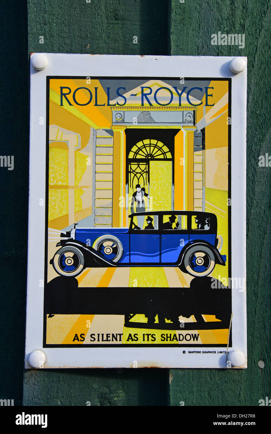 Old tin Rolls Royce advertising sign at Bekonscot Model Village, Beaconsfield, Buckinghamshire, England, United Kingdom Stock Photo