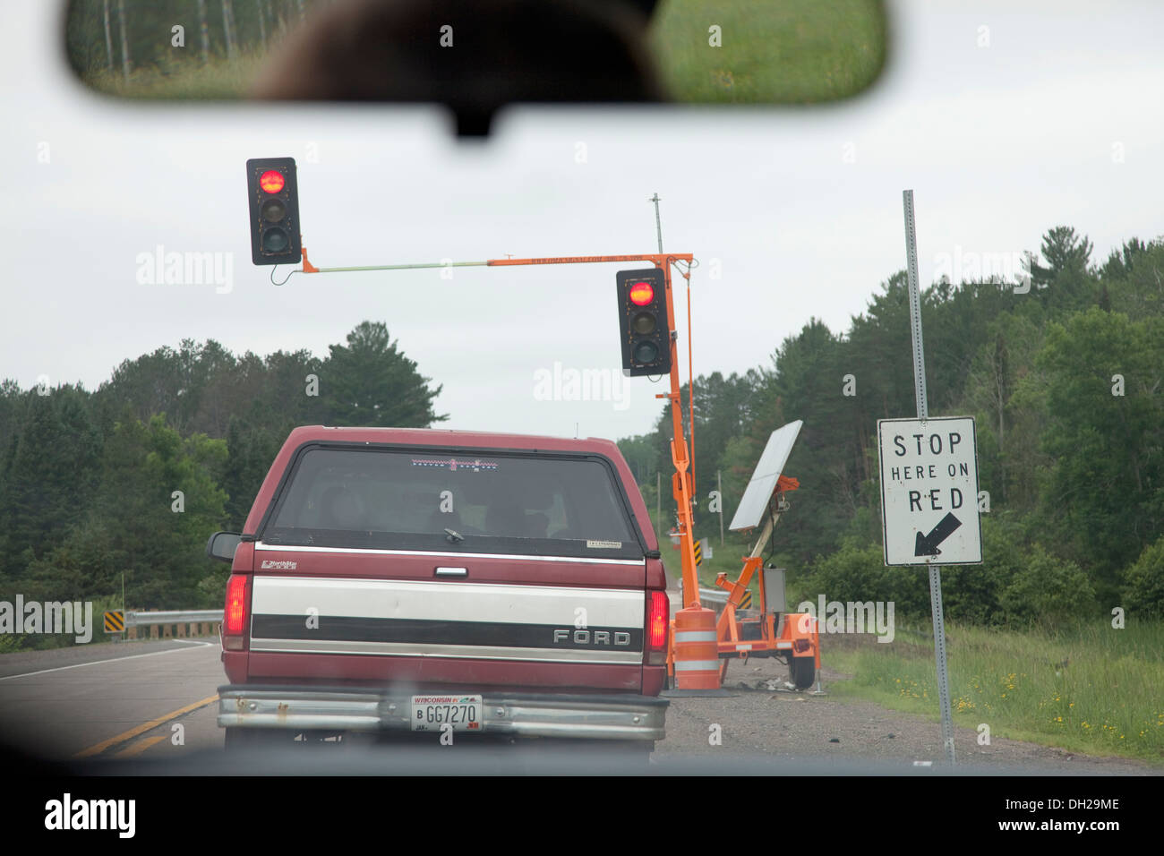 Solar panel providing electric current for traffic semaphore. Hayward Wisconsin WI USA Stock Photo